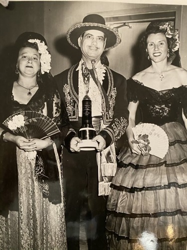 Two Señoritas and a Señor in traditional dress